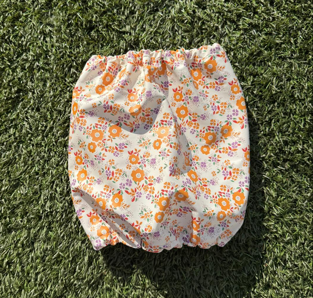 Snood fond beige avec fleurs oranges - imperméable